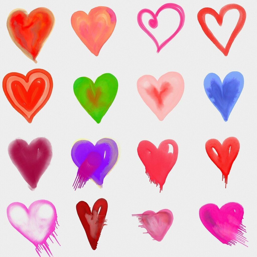 Des coeurs dessinés à l'aquarelle de différentes tailles et couleurs pour figurer toutes les bienfaits de l'activation du système nerveux autonome pour soulager la douleur